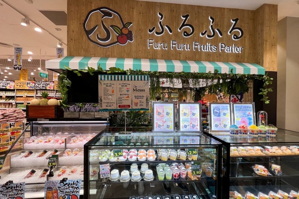 Fresh fruits and juices in the large Furu Furu Fruits Parlor near the entrance of the store.